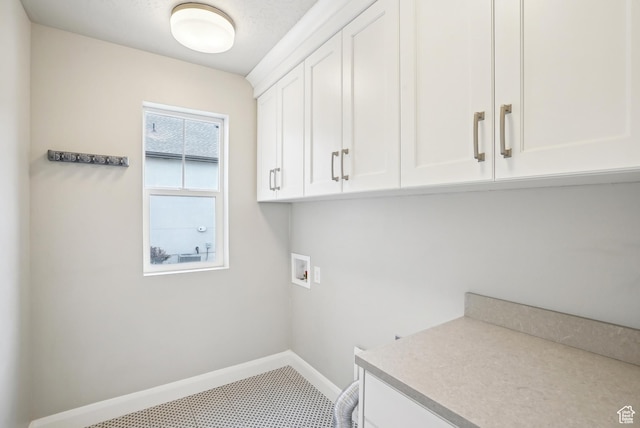 15056 S Sage Terrace Ln Unit 1014, Herriman, UT 84096 - laundry area featuring cabinet space, hookup for a washing machine, and baseboards