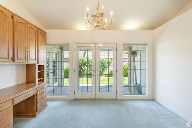 1055 E 900 S Unit 61, St George, UT 84790 - doorway to outside with light colored carpet, a chandelier, and plenty of natural light