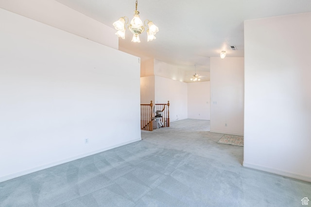 1055 E 900 S Unit 61, St George, UT 84790 - empty room featuring a chandelier, light carpet, and baseboards