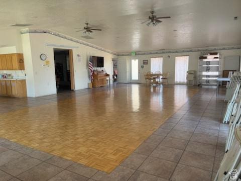 1055 E 900 S Unit 61, St George, UT 84790 - unfurnished living room featuring a ceiling fan
