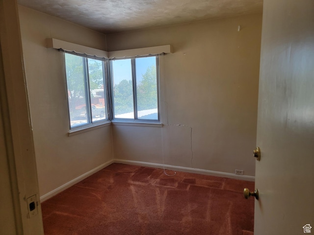494 W 400 S, Cedar City, UT 84720 - empty room with carpet floors, baseboards, and a textured ceiling