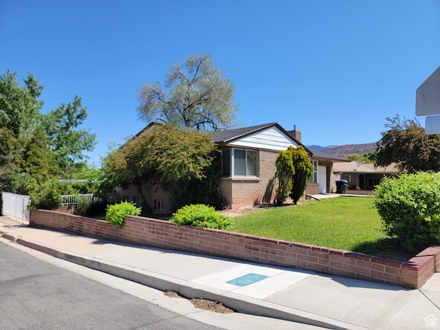 494 W 400 S, Cedar City, UT 84720 - view of front of property featuring a chimney and brick siding