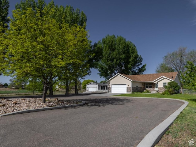 3870 S 2500 E, Vernal, UT 84078 - view of front facade with a front yard and a garage