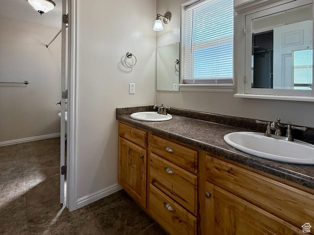 3870 S 2500 E, Vernal, UT 84078 - bathroom with double vanity and baseboards