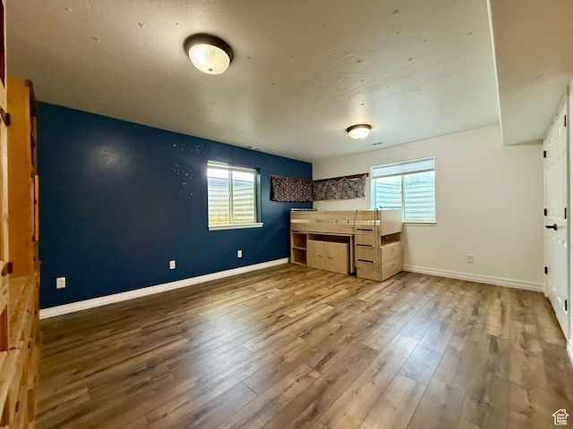 3870 S 2500 E, Vernal, UT 84078 - kitchen featuring healthy amount of natural light, wood finished floors, and baseboards