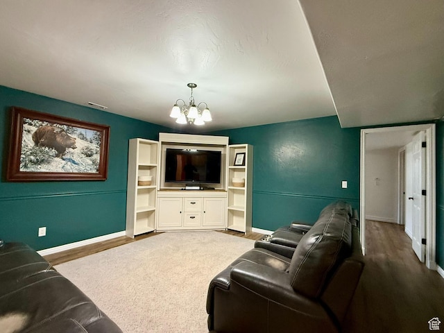 3870 S 2500 E, Vernal, UT 84078 - living room with a chandelier, wood finished floors, and baseboards