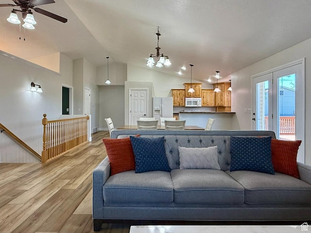 3870 S 2500 E, Vernal, UT 84078 - living area featuring light wood-style flooring, ceiling fan, and vaulted ceiling