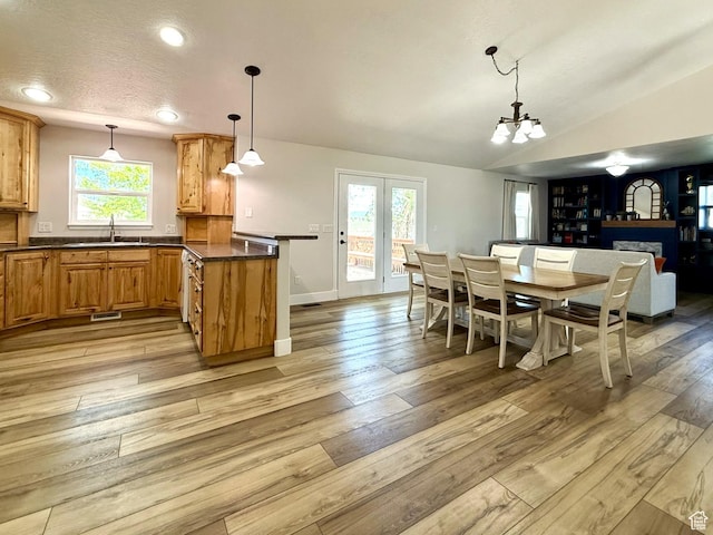 3870 S 2500 E, Vernal, UT 84078 - dining room with a chandelier, light wood-type flooring, recessed lighting, lofted ceiling, and baseboards
