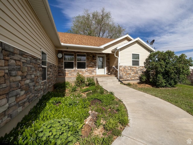3870 S 2500 E, Vernal, UT 84078 - view of exterior entry with stone siding and roof with shingles