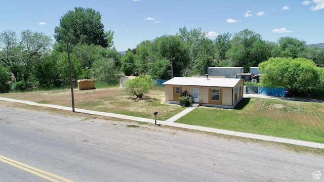 295 N 400 E, Nephi, UT 84648 - view of front of home featuring a front yard and stucco siding