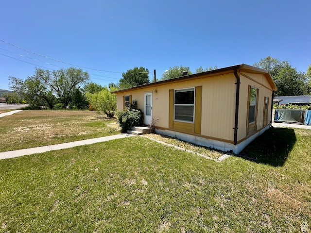 295 N 400 E, Nephi, UT 84648 - view of front of house with a front lawn