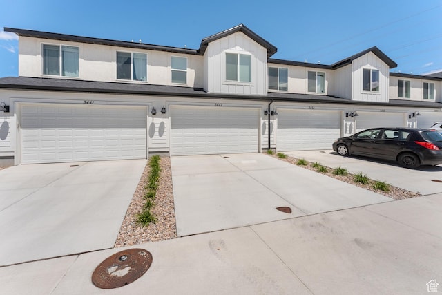 3457 E 1320 S, Spanish Fork, UT 84660 - townhome / multi-family property with an attached garage, board and batten siding, and driveway