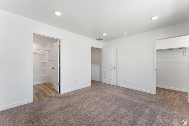 3457 E 1320 S, Spanish Fork, UT 84660 - unfurnished bedroom featuring carpet floors, baseboards, a spacious closet, recessed lighting, and ensuite bath