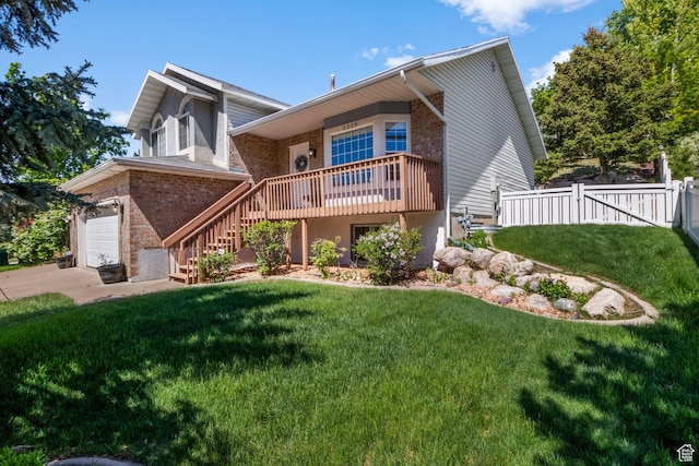 2239 E 3225 N, Layton, UT 84040 - view of front of home featuring brick siding, a garage, concrete driveway, stairway, and a gate