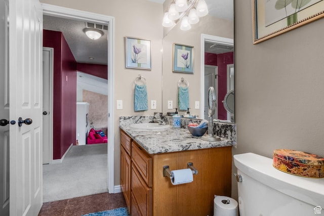 2239 E 3225 N, Layton, UT 84040 - bathroom with vanity, tile patterned floors, and toilet
