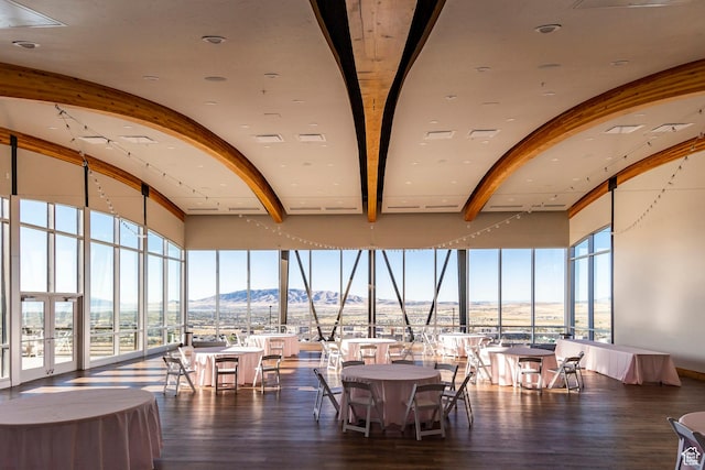 2271 W New Harvest Ln, Lehi, UT 84043 - dining room with beamed ceiling, a mountain view, wood finished floors, expansive windows, and french doors
