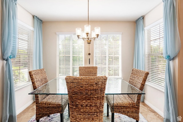 2271 W New Harvest Ln, Lehi, UT 84043 - dining space with a chandelier, light tile patterned floors, and baseboards