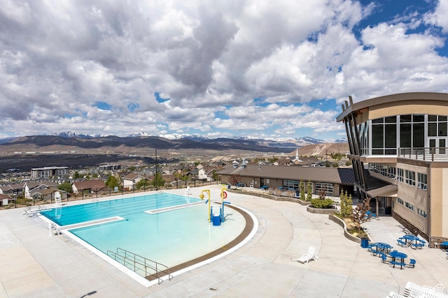 2271 W New Harvest Ln, Lehi, UT 84043 - community pool with a mountain view and a diving board