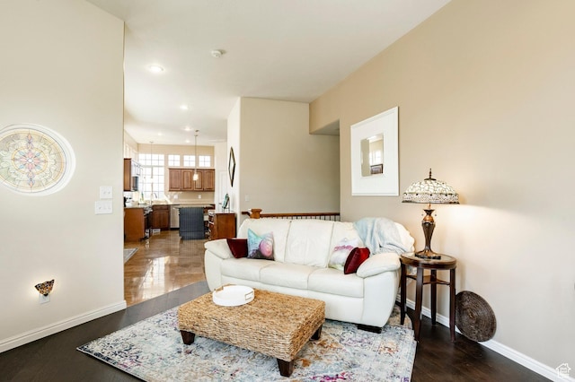 2271 W New Harvest Ln, Lehi, UT 84043 - living room with dark wood finished floors, baseboards, and recessed lighting