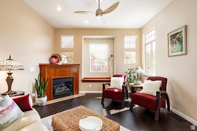 2271 W New Harvest Ln, Lehi, UT 84043 - living area with a ceiling fan, a fireplace with flush hearth, wood-type flooring, baseboards, and recessed lighting