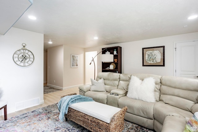 2271 W New Harvest Ln, Lehi, UT 84043 - living room featuring light wood finished floors, baseboards, and recessed lighting