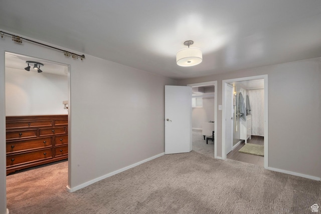 425 N 1300 W, Salt Lake City, UT 84116 - unfurnished bedroom featuring carpet, a walk in closet, a closet, and baseboards