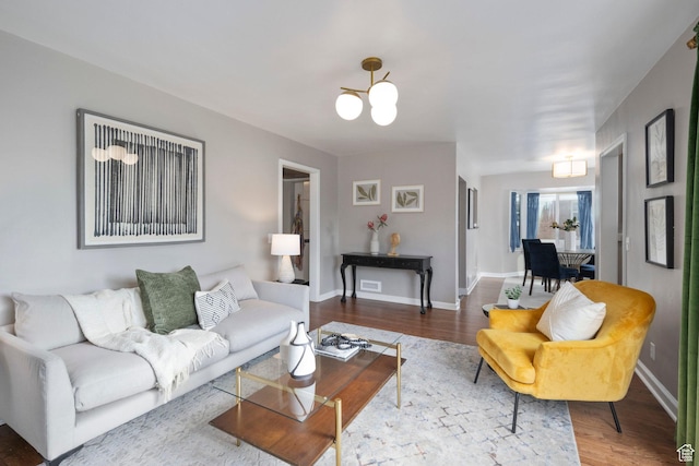 425 N 1300 W, Salt Lake City, UT 84116 - living area featuring wood finished floors, a chandelier, and baseboards
