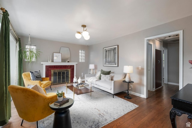 425 N 1300 W, Salt Lake City, UT 84116 - living area featuring dark wood-style floors, baseboards, and a fireplace