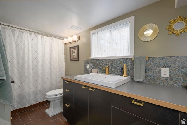 425 N 1300 W, Salt Lake City, UT 84116 - full bathroom with backsplash, toilet, vanity, wood finished floors, and curtained shower