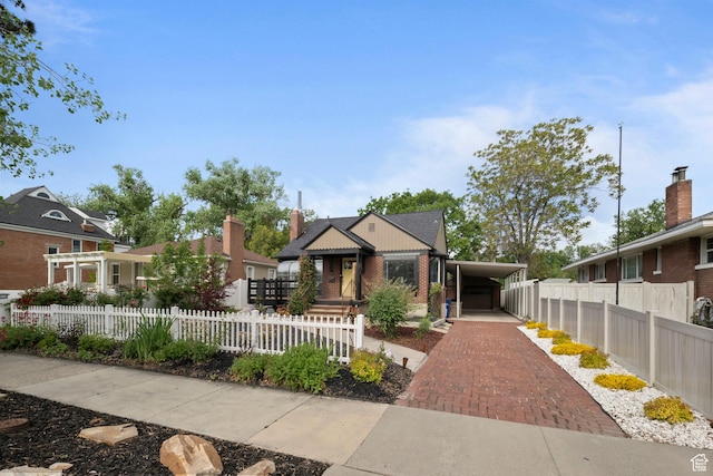 425 N 1300 W, Salt Lake City, UT 84116 - view of front of house with brick siding, decorative driveway, and a carport