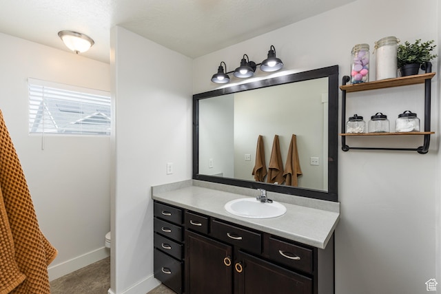 15187 S Sabre Pl, Bluffdale, UT 84065 - bathroom with toilet, vanity, baseboards, and tile patterned flooring