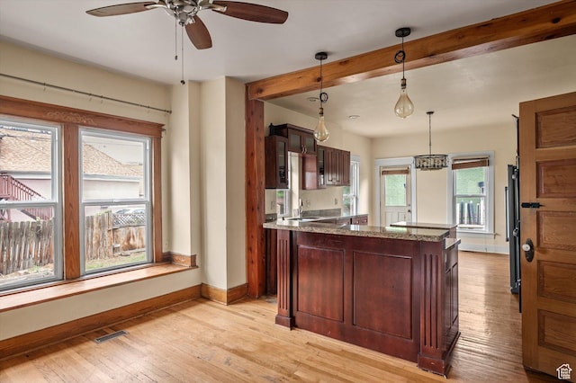 625 S 400 E, Salt Lake City, UT 84111 - kitchen featuring refrigerator, ceiling fan, light wood-type flooring, baseboards, and pendant lighting