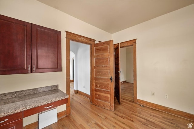 625 S 400 E, Salt Lake City, UT 84111 - unfurnished office with arched walkways, light wood-type flooring, and baseboards