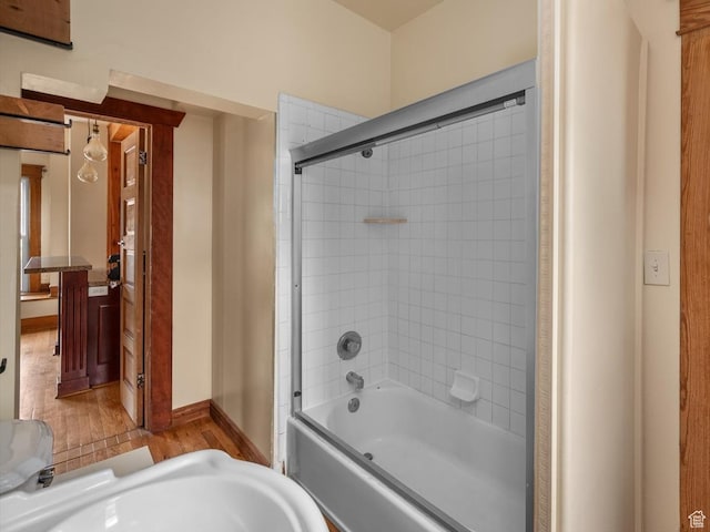 625 S 400 E, Salt Lake City, UT 84111 - bathroom with wood finished floors, enclosed tub / shower combo, a sink, and baseboards