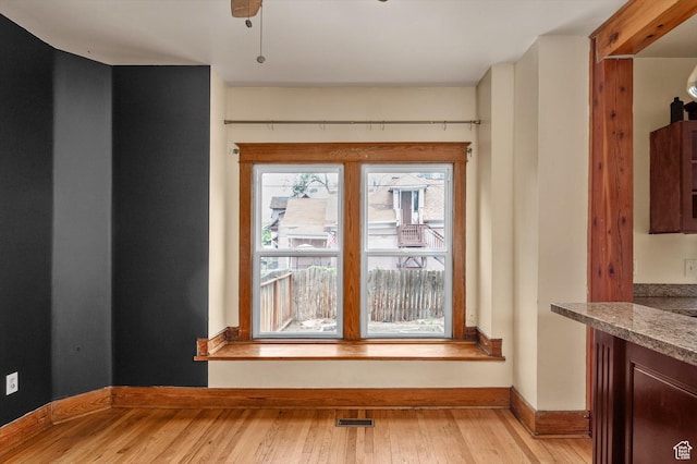 625 S 400 E, Salt Lake City, UT 84111 - unfurnished dining area with light wood finished floors and baseboards