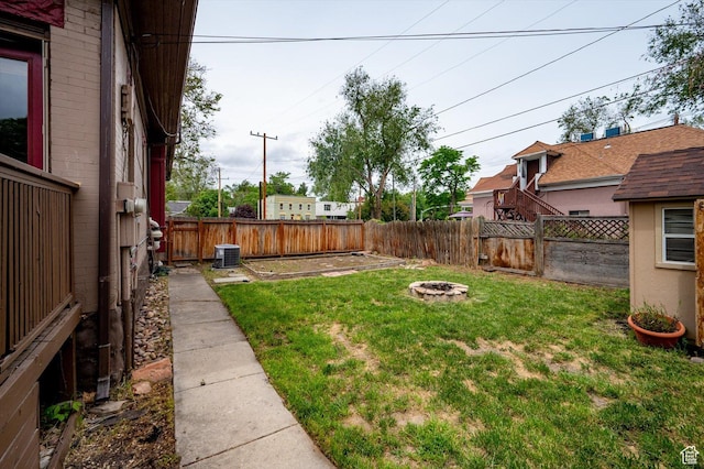 625 S 400 E, Salt Lake City, UT 84111 - view of yard featuring a fire pit and central AC unit