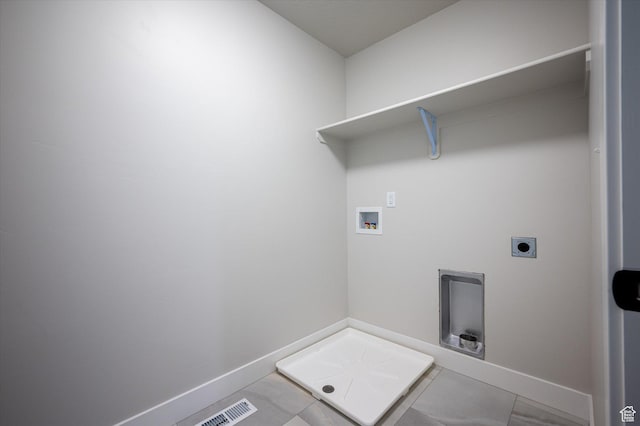 1244 N 350 W Unit 35, Brigham City, UT 84302 - washroom featuring washer hookup, hookup for an electric dryer, and tile patterned flooring