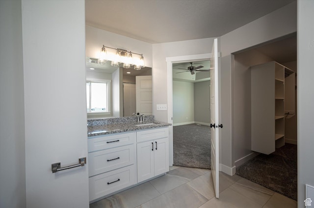 1244 N 350 W Unit 35, Brigham City, UT 84302 - bathroom with a ceiling fan, vanity, and tile patterned flooring