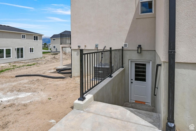1323 E 370 S, Payson, UT 84651 - doorway to property featuring stucco siding and a residential view