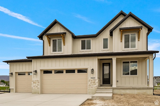 1323 E 370 S, Payson, UT 84651 - view of front of house with driveway, board and batten siding, a porch, and stone siding
