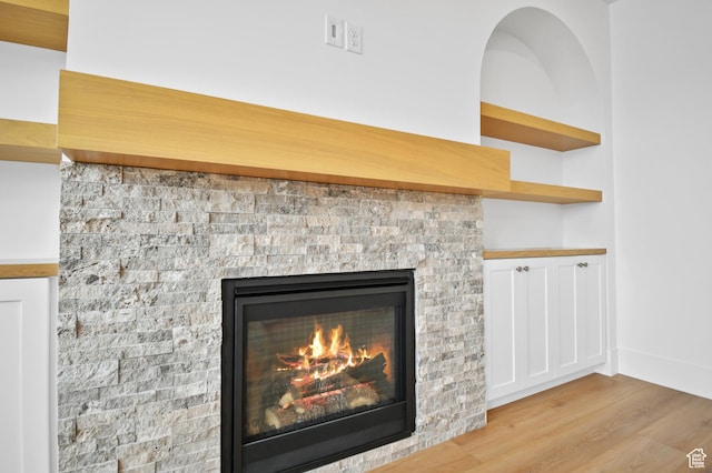 1323 E 370 S, Payson, UT 84651 - detailed view of wood finished floors and a glass covered fireplace
