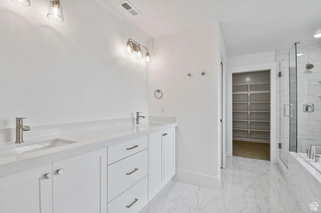 1323 E 370 S, Payson, UT 84651 - bathroom featuring a shower stall, marble finish floors, a spacious closet, baseboards, and double vanity