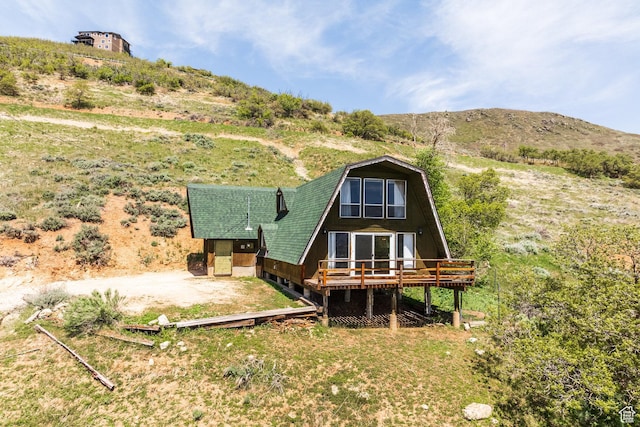 350 Luzern Rd E, Midway, UT 84049 - rear view of property featuring a deck and a gambrel roof