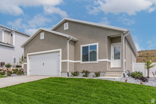 7164 Oquirrh Ranch Pkwy N, Eagle Mountain, UT 84005 - view of front facade with entry steps, stucco siding, concrete driveway, and a garage