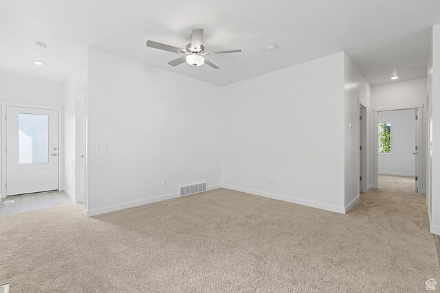 7164 Oquirrh Ranch Pkwy N, Eagle Mountain, UT 84005 - empty room with light carpet, a ceiling fan, baseboards, and recessed lighting