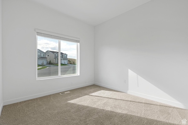 7164 Oquirrh Ranch Pkwy N, Eagle Mountain, UT 84005 - carpeted spare room featuring baseboards