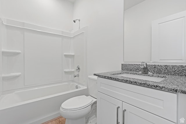 7164 Oquirrh Ranch Pkwy N, Eagle Mountain, UT 84005 - bathroom with toilet, wood finished floors, vanity, and washtub / shower combination