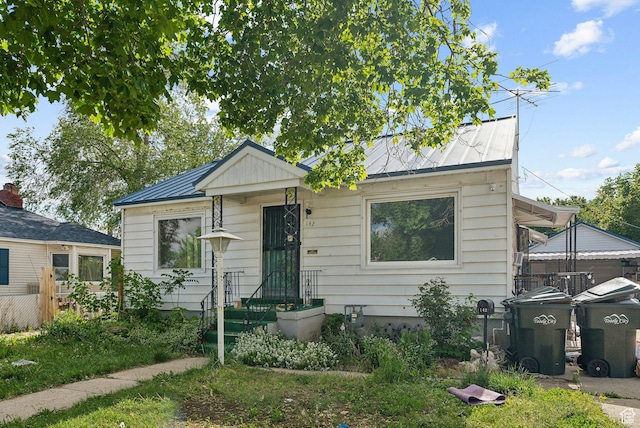 142 N Pinehurst Ave, Tooele, UT 84074 - bungalow-style house featuring metal roof