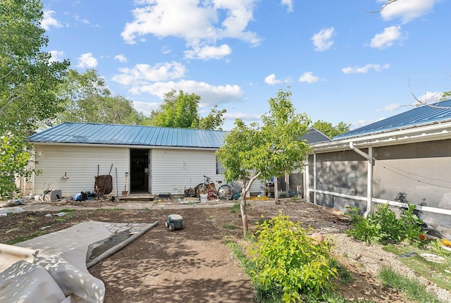142 N Pinehurst Ave, Tooele, UT 84074 - rear view of property with metal roof and a sunroom