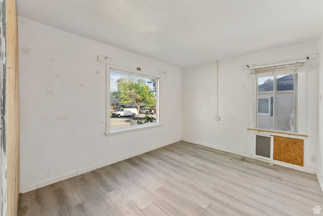 142 N Pinehurst Ave, Tooele, UT 84074 - empty room featuring wood finished floors and baseboards